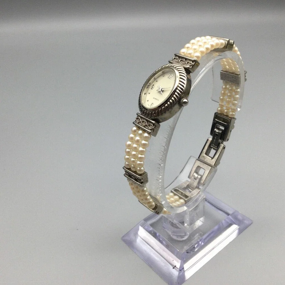 Avon Womens Watch 18mm Cream Oval Dial Faux Pearl Bracelet New Battery